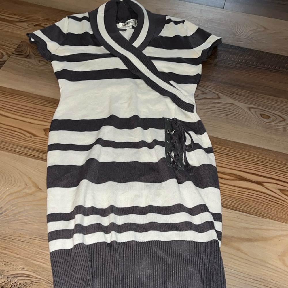 White and grey striped sweater dress with cinched waist and decorative tie